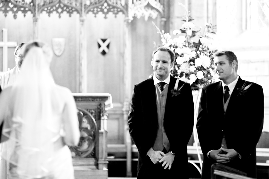 Bride walking down the aisle at St. Michaels' Parish in Linlithgow