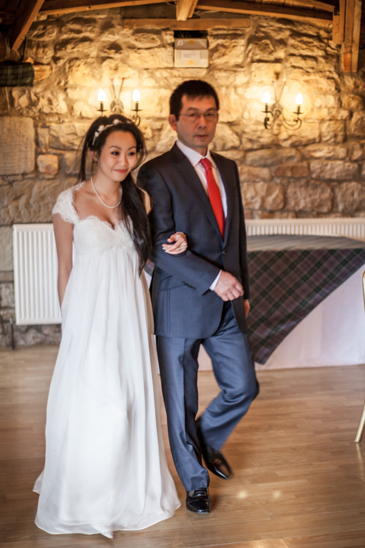 The father gives a way to his daughter at Harburn House wedding ceremony