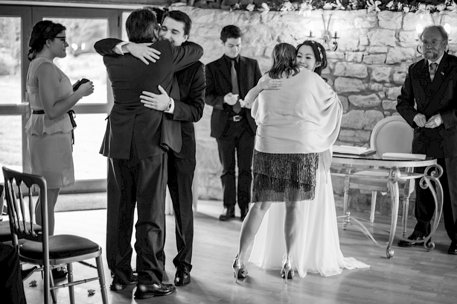 Guests and married couple at Harburn House wedding ceremony