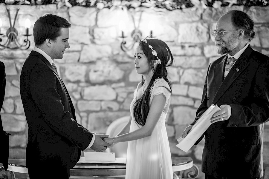 Bride and groom exchanging vows at Harburn House wedding ceremony