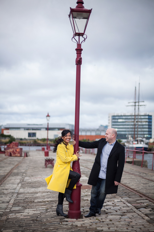 Couple having fun during the portraits session in Edinburgh