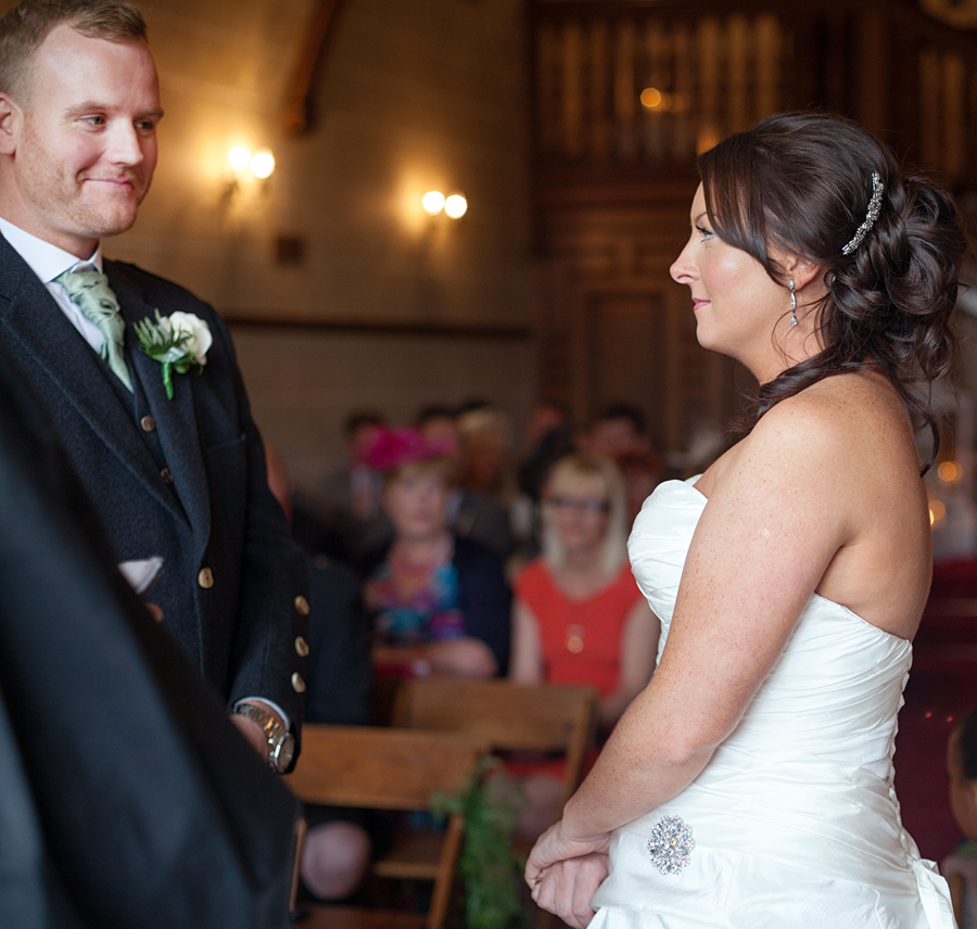 Bride and Groom during the wedding ceremony at Dalhousie Castle