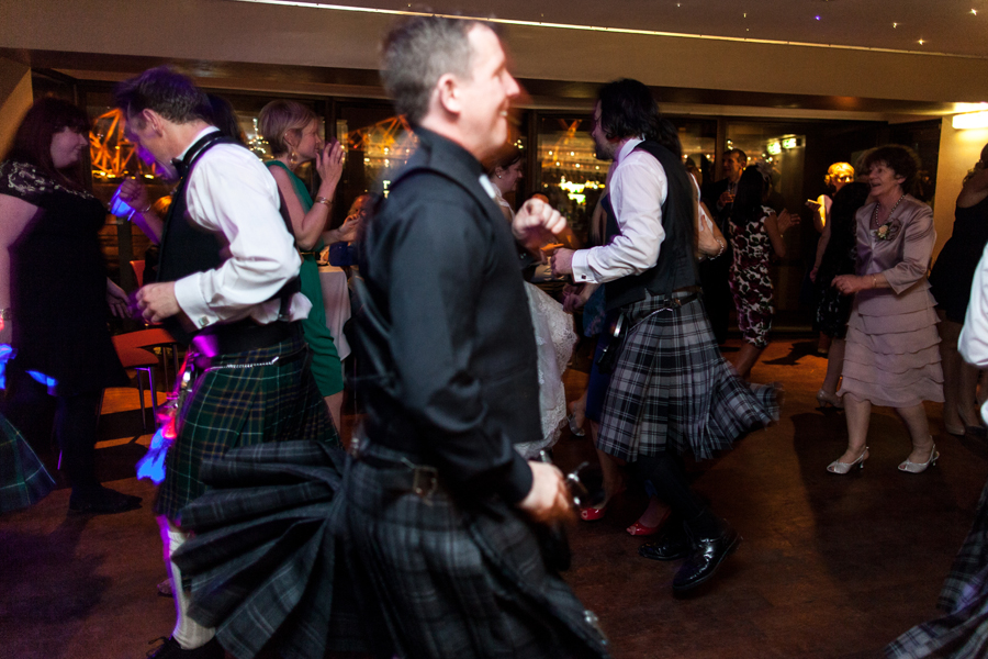 Wedding guests dancing at Orocco Pier in South Queensferry during wedding celebrations