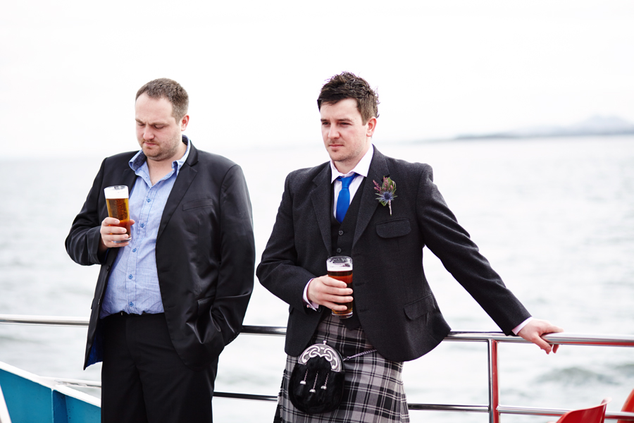 On the way to Inchcolm Island guests enjoying beer