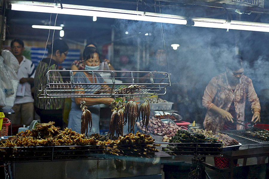 Busy street food stand in Vietnam