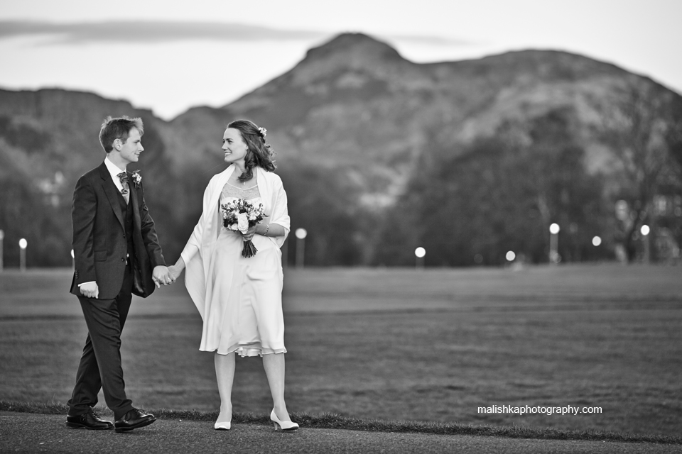 Bride and groom walking in the Links