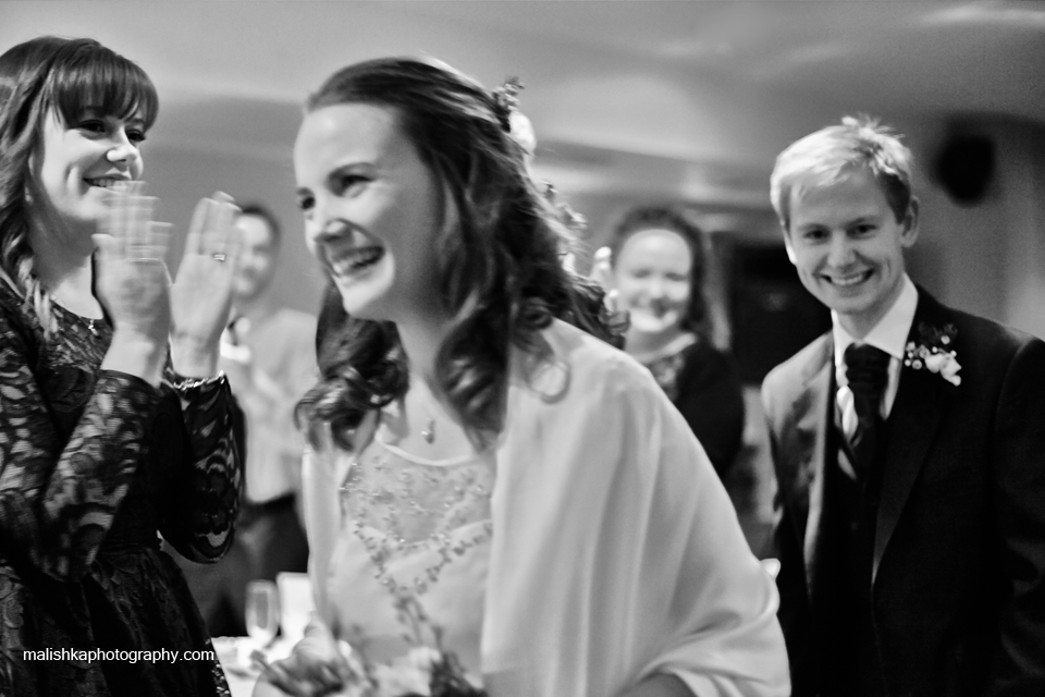 Bride and groom entering the room