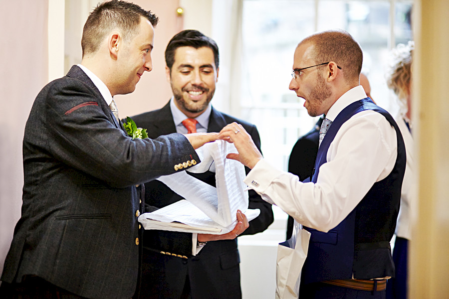 Surprised couple  at civil partnership at Royal College of Physicians in Edinburgh