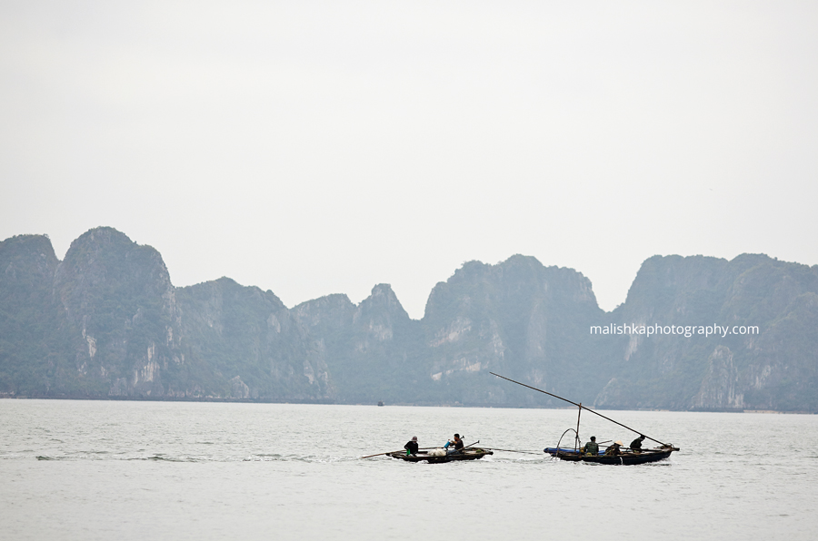 Fishermen boats at Ha Long Bay