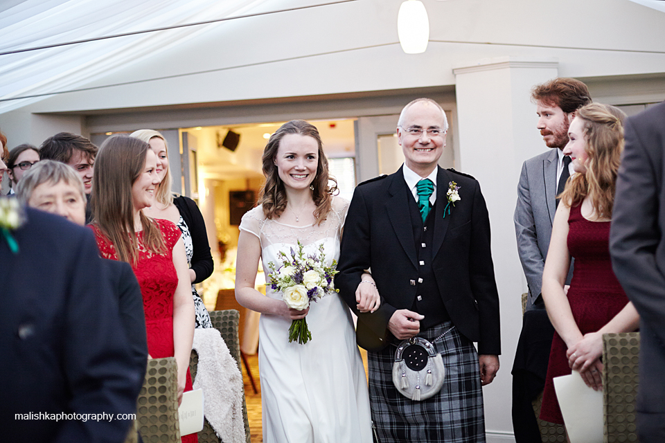 Bride and her father during the wedding ceremony at Bruntsfield Hotel in Edinburgh