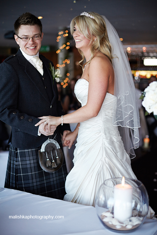 Happy couple at the wedding ceremony in South Queensferry