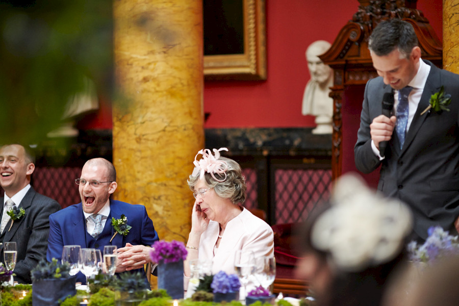 Laughing couple during the speeches at Royal College of Physicians in Edinburgh