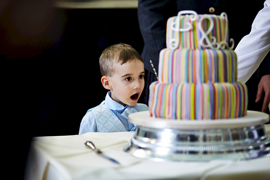 Kid looking at the wedding cake at Royal College of Physicians in Edinburgh
