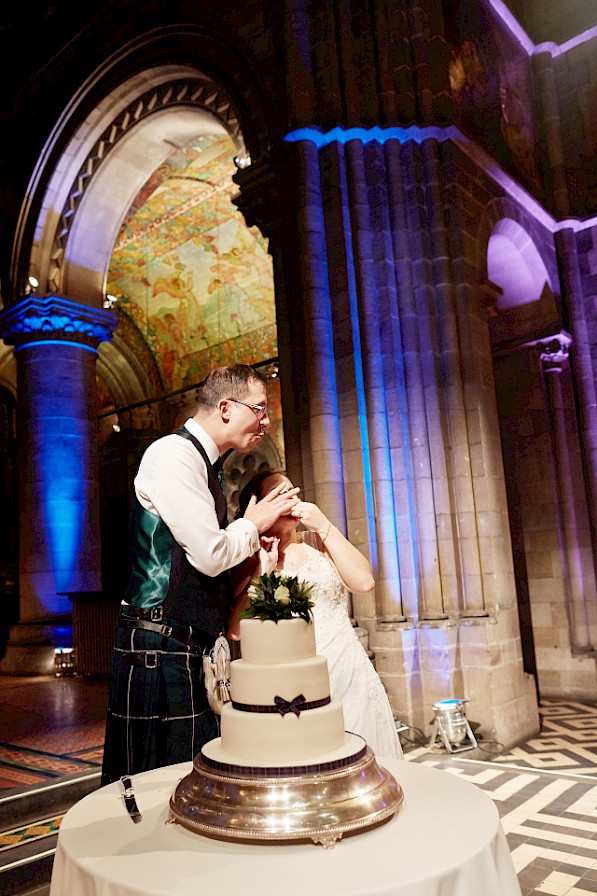happy couple during a cake cutting at Mansfield Traquair