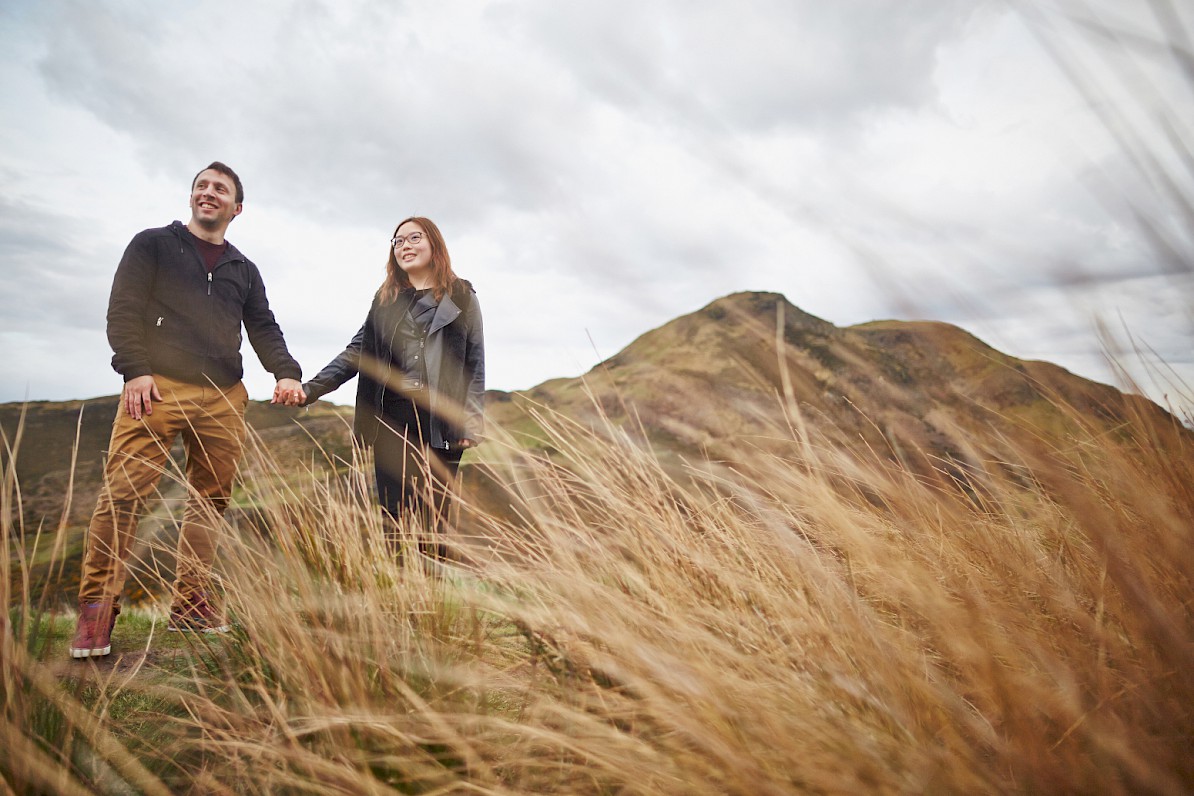 happy couple during a photo session on Arthur's Seat