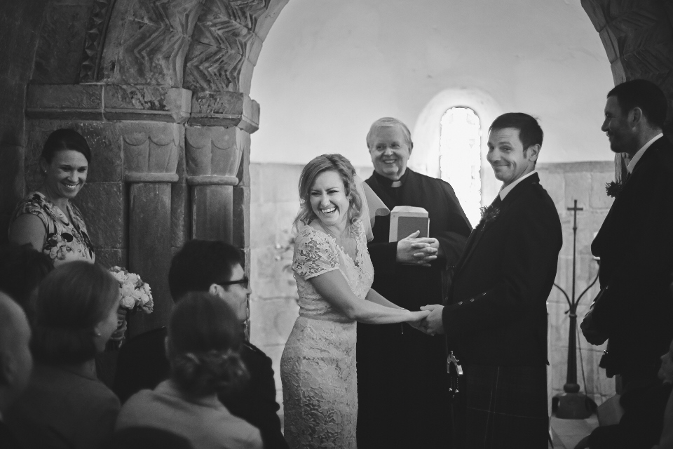Happy bride during Edinburgh Castle ceremony at St. Marys Chapel