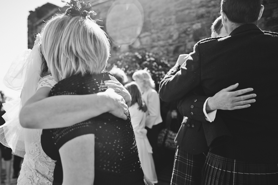 Happy couple with their guests at Edinburgh Castle wedding
