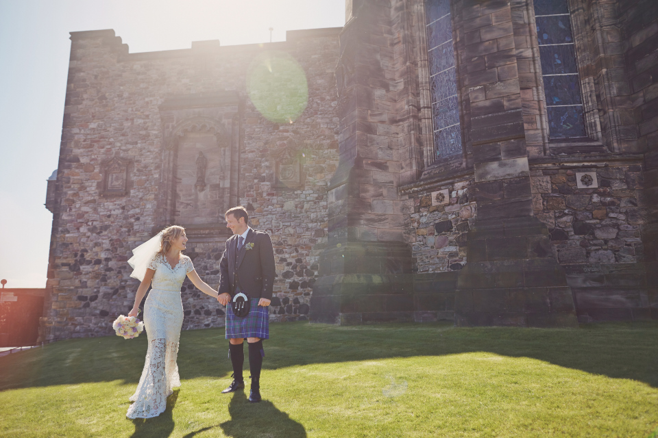 happy couple portraits at Edinburgh Castle wedding