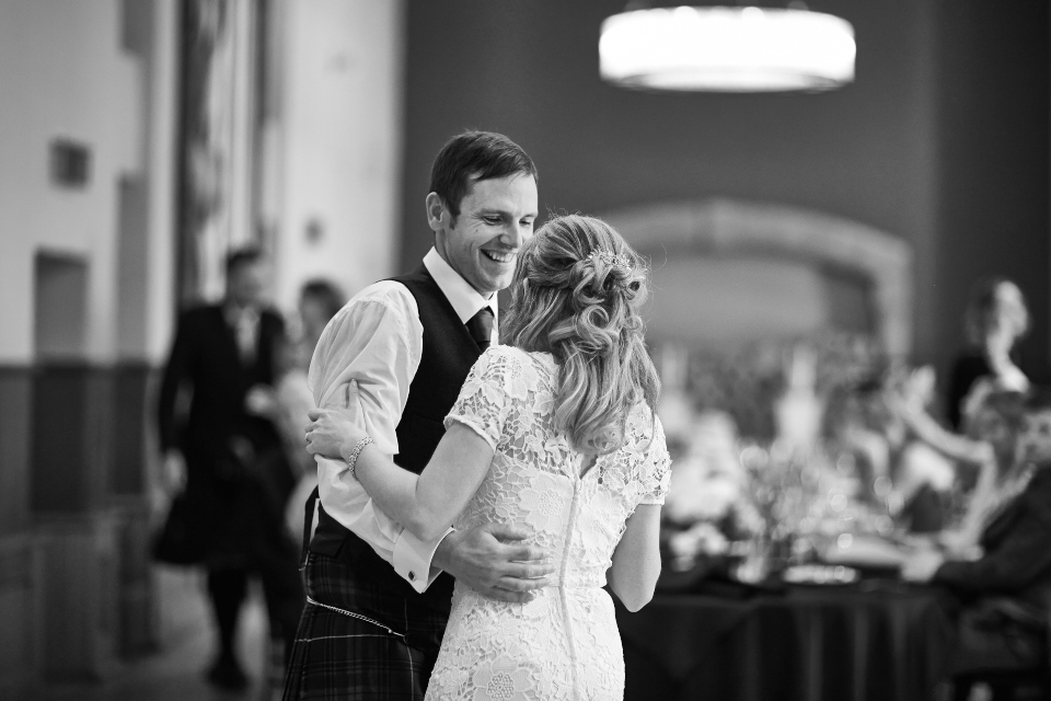 Happy bride and groom during the first dance at Edinburgh Castle wedding