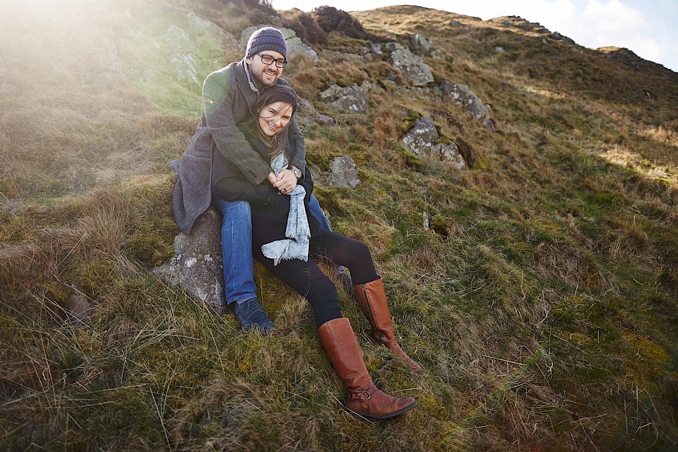 happy couple during a photo session on Arthur's Seat